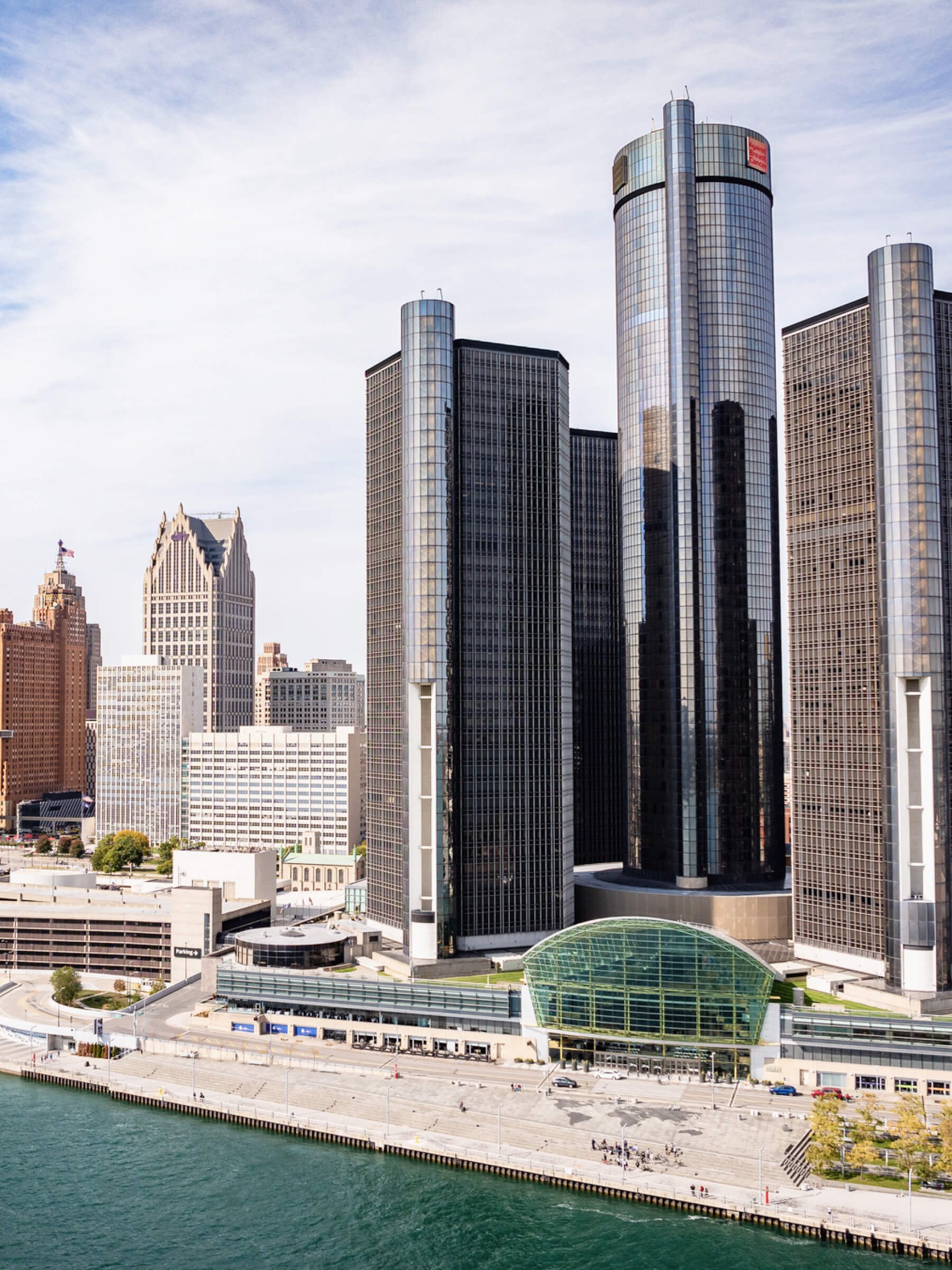 Skyscrapers and high-rise buildings along a waterfront in a city skyline